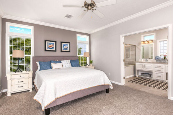 The large master bedroom opens into the elegant master bathroom